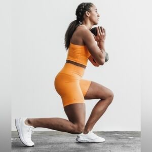 NOBULL Women's Bright Orange Bike Shorts